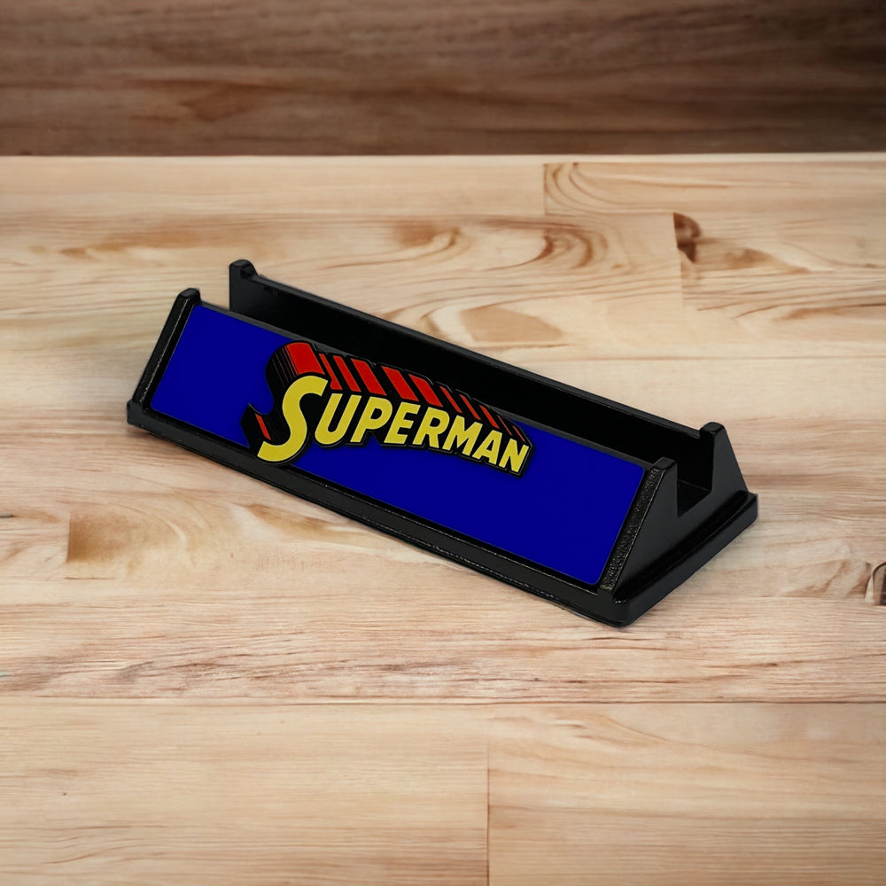 
                  
                    Superman Comic Stand (Blue with Red Shadow)
                  
                